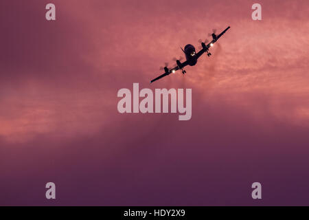 A Lockheed P-3C Orion reconnaissance aircraft with Fleet Air-wing 4 of the Japanese Maritime Self Defence Force (JMSDF) flying near Atsugi airbase, Japan Stock Photo