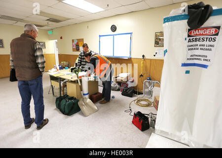 Napa, CA, USA. 13th Dec, 2016. An asbestos abatement team works at the Napa Salvation Army which is undergoing a number of renovations in both the community area and the kitchen. © Napa Valley Register/ZUMA Wire/Alamy Live News Stock Photo