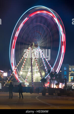 Bournemouth, Dorset, UK 16 December 2016. Big Ferris Wheel lights up Bournemouth seafront. The wheel is 33 metres high and has 27 gondolas. Credit: Carolyn Jenkins/Alamy Live News Stock Photo