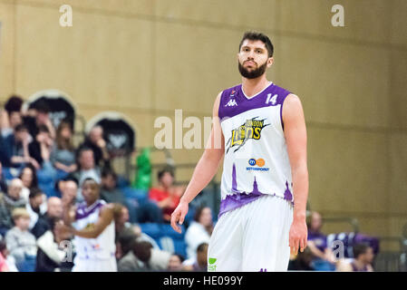 Newcastle, UK, 16 December 2016.  Newcastle Eagles beat London Lions 89 vs 82 in an exciting BBL Cup semi-final basketball game. London Lion's Zak Wells (14) moving up court during play. ©pmgimaging/Alamy Live News Stock Photo