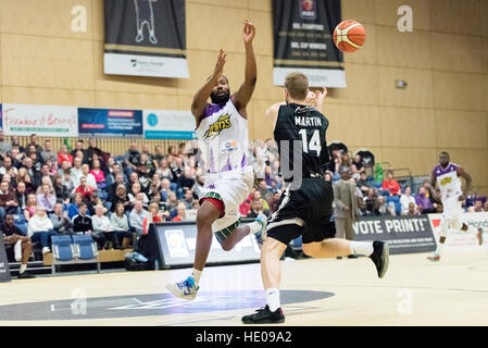 Newcastle, UK, 16 December 2016.  Newcastle Eagles beat London Lions 89 vs 82 in an exciting BBL Cup semi-final basketball game.  Newcastle Eagles'  Scott Martin (14) defends against London Lion's  Zaire Taylor (11). ©pmgimaging/Alamy Live News Stock Photo