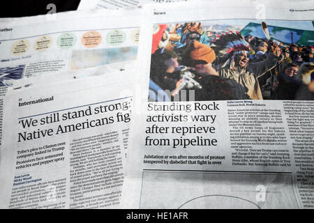 Native Americans at Standing Rock pipeline First Nations  protest article in Guardian newspaper  London UK Stock Photo