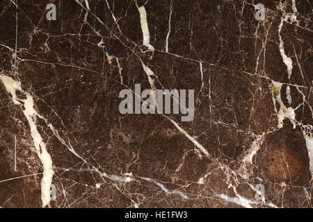 white pattern in dark brown marble texture background Stock Photo
