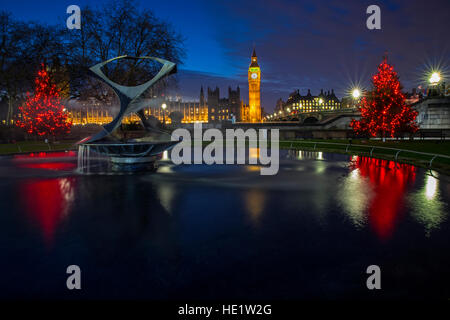 A view of a beautiful illuminated Christmas tree with the Houses of Parliament in the background, London. Stock Photo