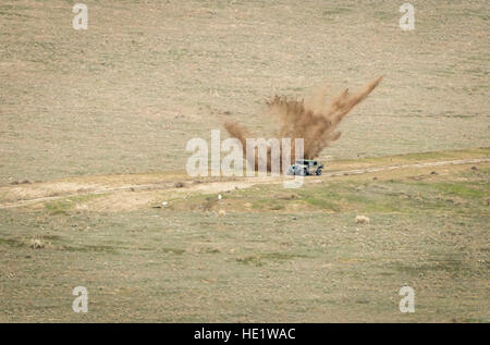 An inert GBU-12 bomb, dropped by an F-35A, impacts next to its intended target during testing of the close air support capabilities of the F-35A at Sailor Range, part of the Mountain Home Air Force Base complex, Idaho, Feb 16, 2016. Joint Terminal Attack Controllers JTAC of Naval Special Warfare Group 1 directed attacks by six operational test and evaluation F-35As, supported by more than 85 Airmen, of the 31st Test and Evaluation Squadron, a tenant unit at Edwards Air Force Base, Calif., which travelled to Mountain Home AFB to conduct the first simulated deployment test of the F-35A, specific Stock Photo