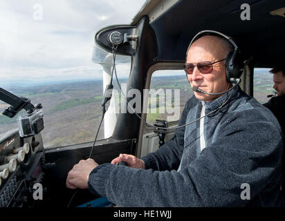 Retired Col. Pete Mapes, a pilot-physician, demonstrates a ground collision avoidance system he installed on his Cessna aircraft during a flight over Maryland, April 7, 2016. Mapes was instrumental to the employment of Auto GCAS in fighter jets across the Air Force and co-wrote the first Air Force instruction for pilot-physicians. Because of unique medical and human factors qualifications, pilot-physicians are particularly well suited to help develop new aircraft, life support equipment and avionics or software upgrades, and to ensure that changing missions can be accommodated by crews and air Stock Photo