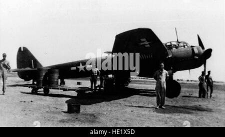 The Junkers Ju 88 delivered to the Allied forces by a Rumanian defector on July 1943. The plane, a Ju 88D-1/Trop later designated Ju 88D-3 for long-range photographic reconnaissance, built on 1943, was flown from Romania to Cyprus and captured intact by the Royal Air Force. Afterwards the RAF turned the plane to the U.S. Army Air Forces in North Africa. In this photo, from the collection of Francis E. Hudlow, 65th Fighter Squadron's official photographer, the former Rumanian Ju 88 in Tunisia, with the Allied markings British on the fin and American stars on the fuselage and under the wing adde Stock Photo