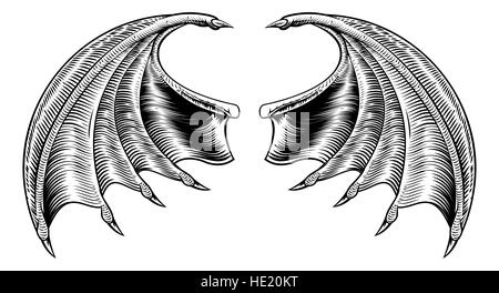 A demon dragon or vampire bat wings horror Halloween design in a vintage woodcut style Stock Photo