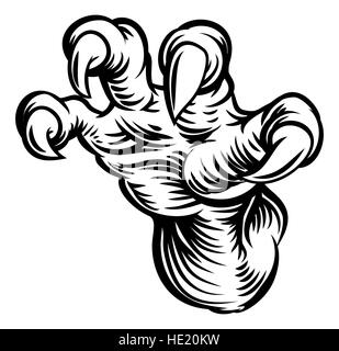 A claw, talon or monster hand design in a vintage woodcut style Stock Photo