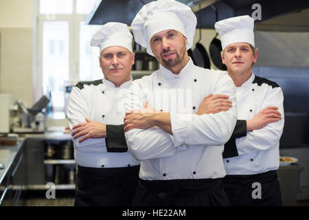 Team of chefs in the kitchen Stock Photo