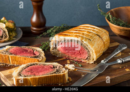 Homemade Christmas Beef Wellington with a Pastry Crust Stock Photo