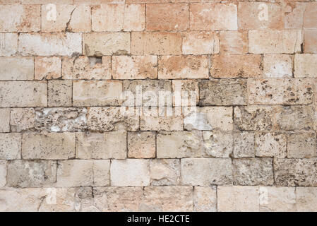 Old and weathered large stone blocks wall texture Stock Photo