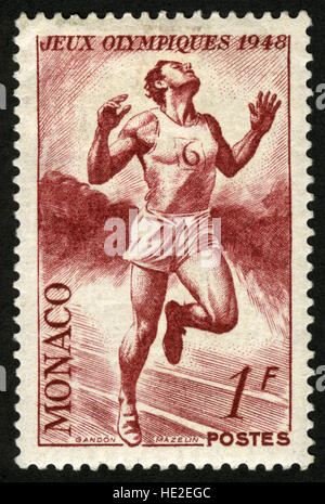 Postage stamp from Monaco depicting a sprinter, for the 1948 Olympic games. Stock Photo