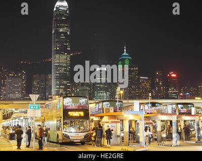 View of the Bus Station at the Star Ferry terminal at 'Tsim Sha Tsui' Kowloon Hong Kong at night Stock Photo