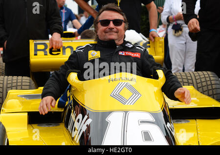 René Arnoux, French former racing driver who competed in 12 Formula One seasons (1978 to 1989). Squeezing into a Renault RS01 classic F1 car Stock Photo