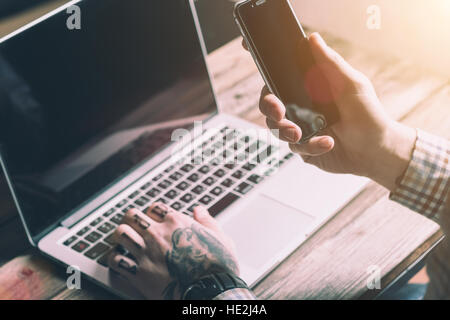 Mock-up With Laptop On Wooden Table Stock Photo