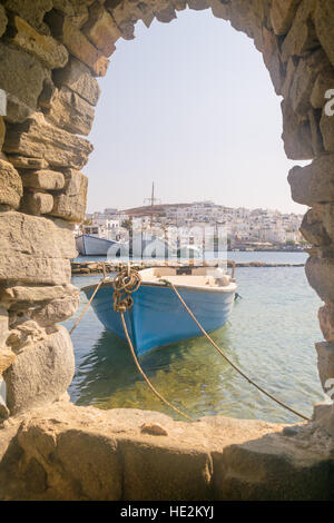 Old boat at Paros island in Greece. View from inside the Kastelli castle. Stock Photo