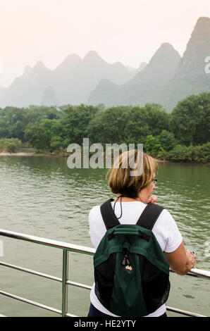 Karst landscape on Li River boat cruise yangshuo guilin guangxi, China. (MR) Stock Photo