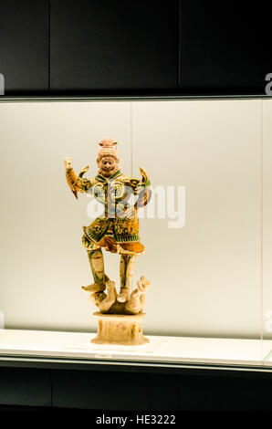 Ancient polychrome glazed porcelain ceramic pottery heavenly guardian figurine statue exhibit at Shanghai Museum Shanghai China. Stock Photo