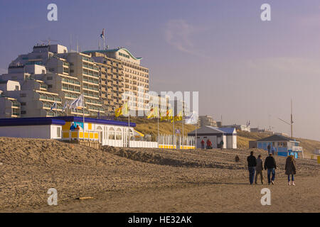 NOORDWIJK, NETHERLANDS - Resort town on the North Sea coast. People walk on beach. Stock Photo