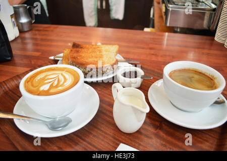 CARDIFF, UK. 13th October 2016. Coffee and toast ready to be served in The Plan cafe in the Morgan Arcade. © Jessica Gwynne - Freelance Photographer Stock Photo