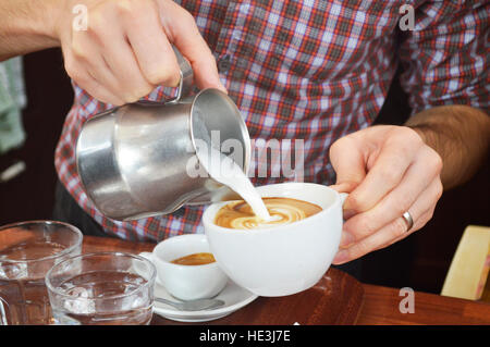 CARDIFF, UK. 13th October 2016. Coffee being made by barista Trevor Hyam from Lincolnshire in The Plan cafe in the Morgan Arcade. © Jessica Gwynne - F Stock Photo