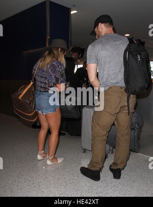 Hilary Duff departs from the airport with her new boyfriend Jason