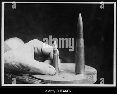 Bullets from a German anti-tank rifle and a British rifle, Stock Photo