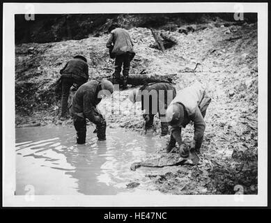 Tommies cleaning up their trench waders Stock Photo