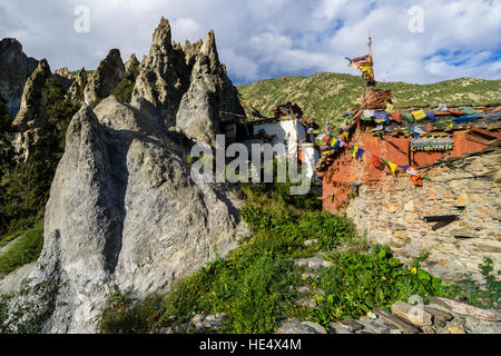 The buildings of Braga Gompa are perched on a rocky slope Stock Photo