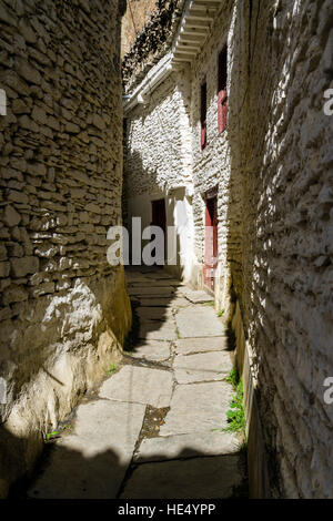 A small alleyway between the houses of the the village Stock Photo