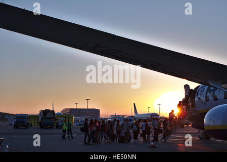Passengers board Ryanair flight at Athens Airport, bound for London Stansted Stock Photo