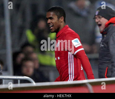 Darmstadst, Germany. 18th Dec, 2016. Munich's Douglas Costa celebrates after his goal at 1:0 during the Bundesliga soccer match between Darmstadt 98 and Bayern Munich at Jonathan Heimes stadium in Darmstadst, Germany, 18 December 2016. Photo: Hasan Bratic/dpa/Alamy Live News Stock Photo