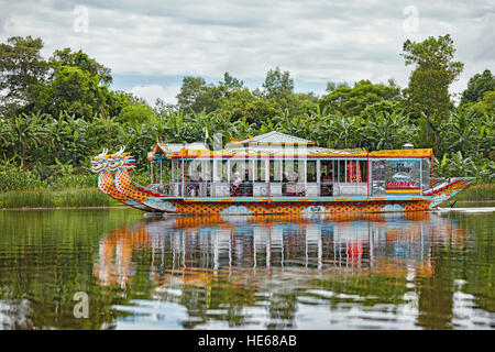 Dragon boat with tourists on the Perfume River. Hue, Vietnam. Stock Photo