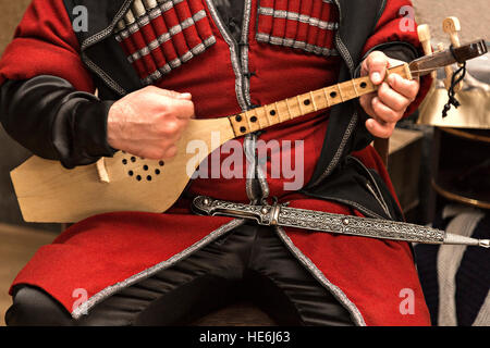 Georgian traditional string musical instrument known as Panduri. Stock Photo