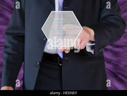 a businessman pushing programming language concepts Stock Photo