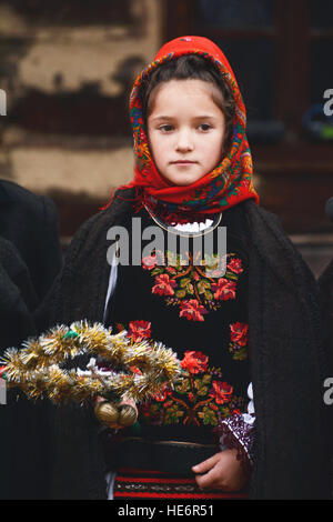 Girl dressed in traditional Romanian clothes Stock Photo