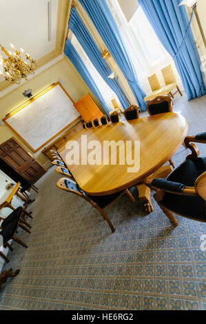 Long wooden table in the boardroom of the Harbour Commissioners' Office, Belfast Stock Photo