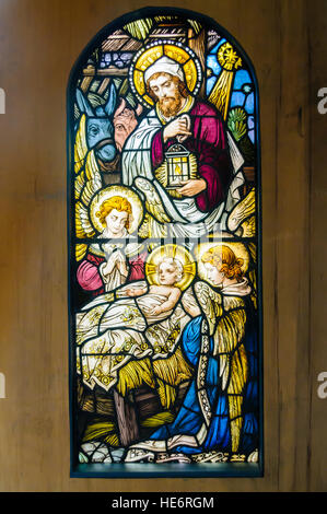 Stained glass window depicting the birth of Jesus in Bethlehem. Stock Photo