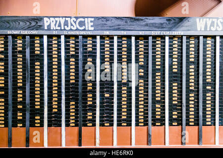Clock-in cards and lockers used by workers in the Lenin Shipyard, in the European Solidarity Centre, Gdansk Stock Photo