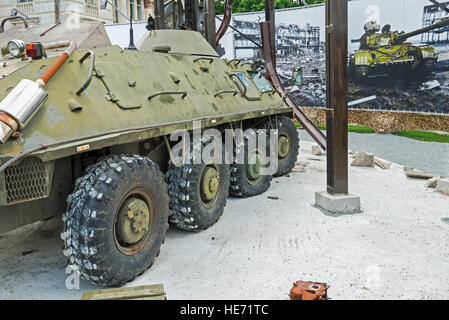 Dnepropetrovsk, Ukraine - May 19, 2016: Open air museum dedicated to war in the Donbass. Survivor armored troop-carrier of the Donetsk airport Stock Photo