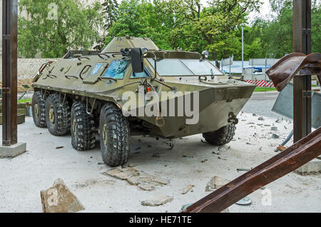 Dnepropetrovsk, Ukraine - May 19, 2016: Open air museum dedicated to war in the Donbass. Ukrainian armored troop-carrier of the Donetsk airport Stock Photo