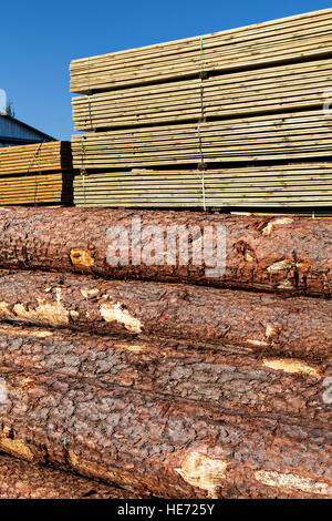 Stack of wooden beam and boards in sawmil Stock Photo