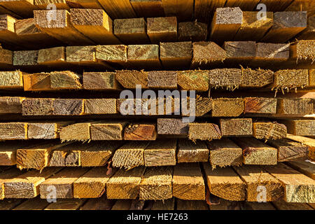 Stack of wooden boards in sawmill Stock Photo