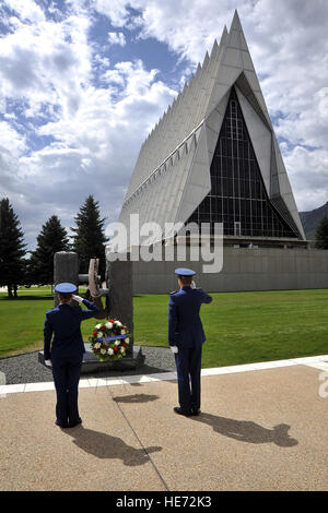 U.S. Air Force Academy Cadet 1st Class Austin Nash, left, and Cadet 3rd Class Alexandra Lingle salute during a ceremony marking the anniversary of the Sept. 11, 2001, terrorist attacks on the United States at the Air Force Academy in Colorado Springs, Colo., Sept 11, 2012. Terrorists hijacked four passenger aircraft Sept. 11, 2001. Two of the aircraft were deliberately crashed into the World Trade Center in New York; one was crashed into the Pentagon; the fourth crashed near Shanksville, Pa. Nearly 3,000 people died in the attacks.  Raymond McCoy, U.S. Air Force Stock Photo