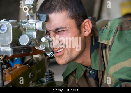 100510-F-1020B-013 Kabul - An Afghan National Army soldier looks through the eye sight of an SPG-9 Kopye, a 73-millimeter caliber recoilless gun developed by the Soviet Union, during a heavy weapons class at the Kabul Military Training Center May 8, 2010. The three-week weapons class is one of 11 Advanced Combat Training courses offered after basic training.  Staff Sgt. Sarah Brown/) Stock Photo