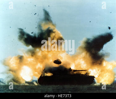 An M-48 tank shortly after being struck by an AGM-65 Maverick missile. Stock Photo