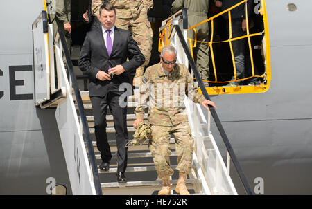 U.S. Army Maj. Gen. Gregory Vadnais, Michigan National Guard Adjutant General, and Raimonds Vējonis, Latvian president elect, exit a Michigan Air National Guard KC-135 Stratotanker June 10, 2015, at Riga International Airport, Latvia. U.S. National Guardsmen hosted the Latvian president elect and several distinguished visitors during exercise Saber Strike 15. The visitors were able to view up-close how the Michigan and Pennsylvania Air National Guard conduct aerial-refueling and support ground troops by refueling a Maryland ANG A-10 Thunderbolt II.  Staff Sgt. Armando A. Schwier-Morales) Stock Photo