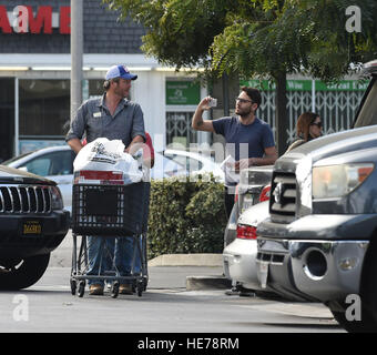 Gwen Stefani and Blake Shelton go shopping with her son Apollo  Featuring: Blake Shelton Where: Los Angeles, California, United States When: 16 Nov 2016 Stock Photo