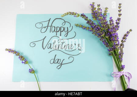 Happy Valentines day calligraphy card with lavender flowers Stock Photo